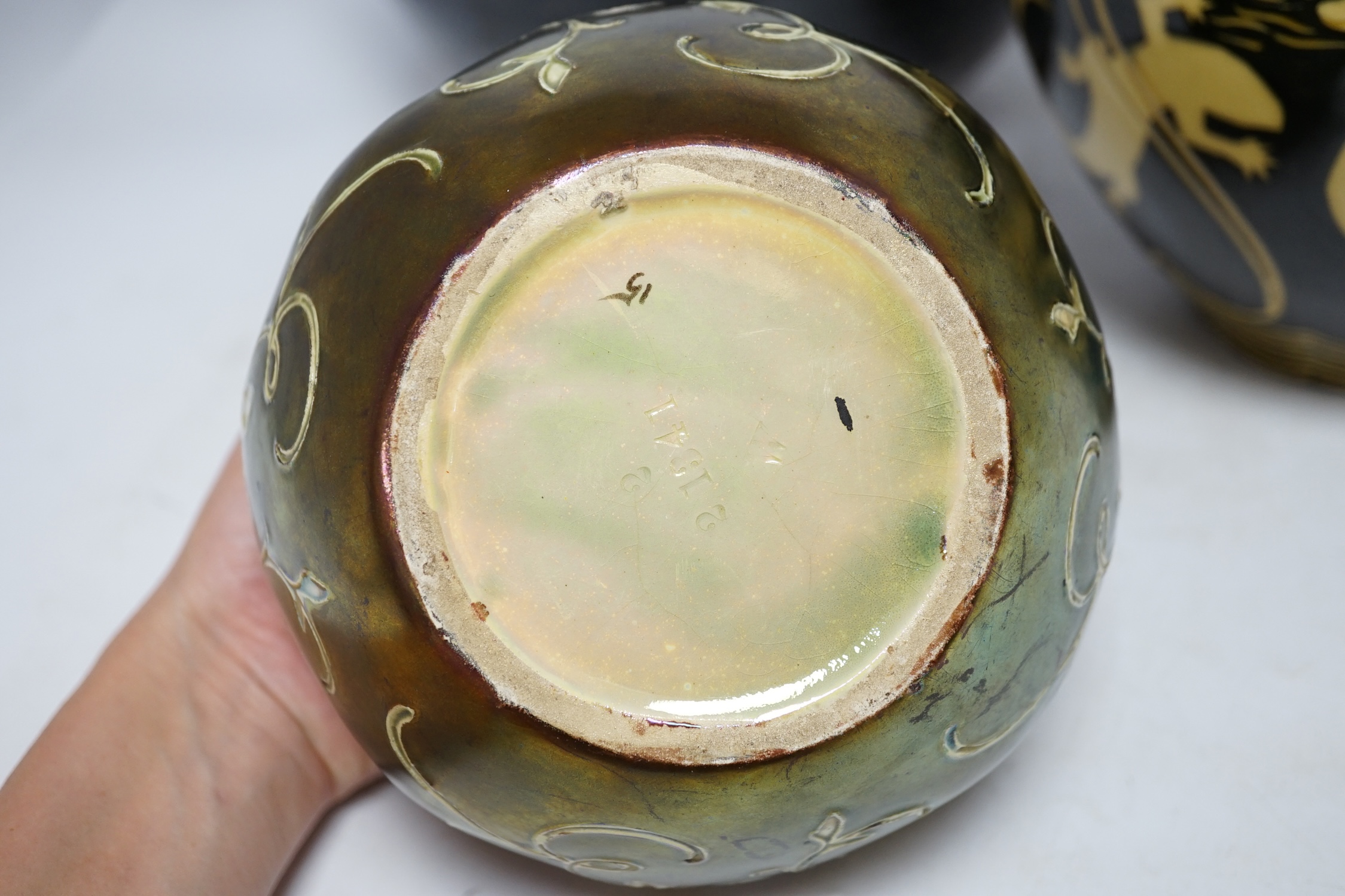 A large Winchcombe pottery bowl by Neil Alcock, a ‘lizard’ jardiniere and a lustre glazed small jardiniere, tallest 19cm., Condition - two fair, smallest example poor